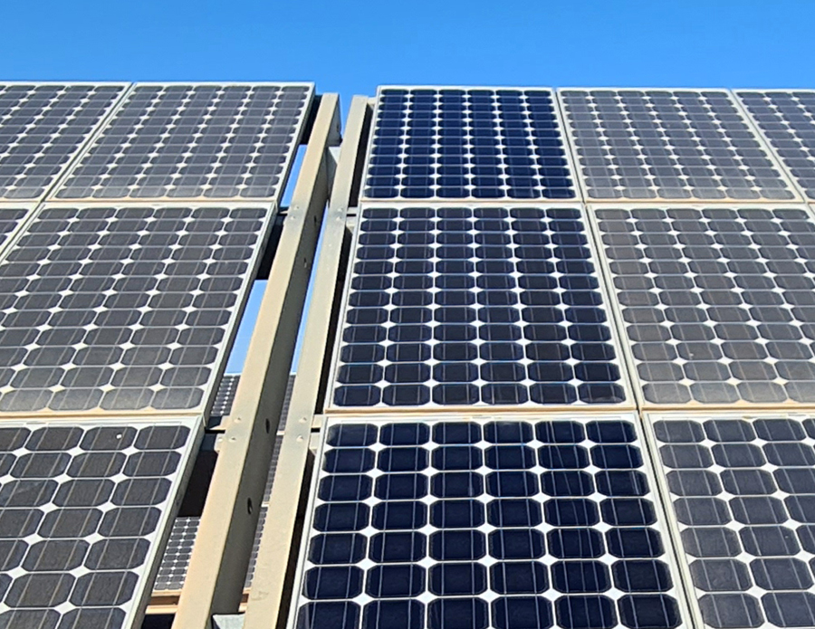 Solar panels in a photovoltaic plant with soiling